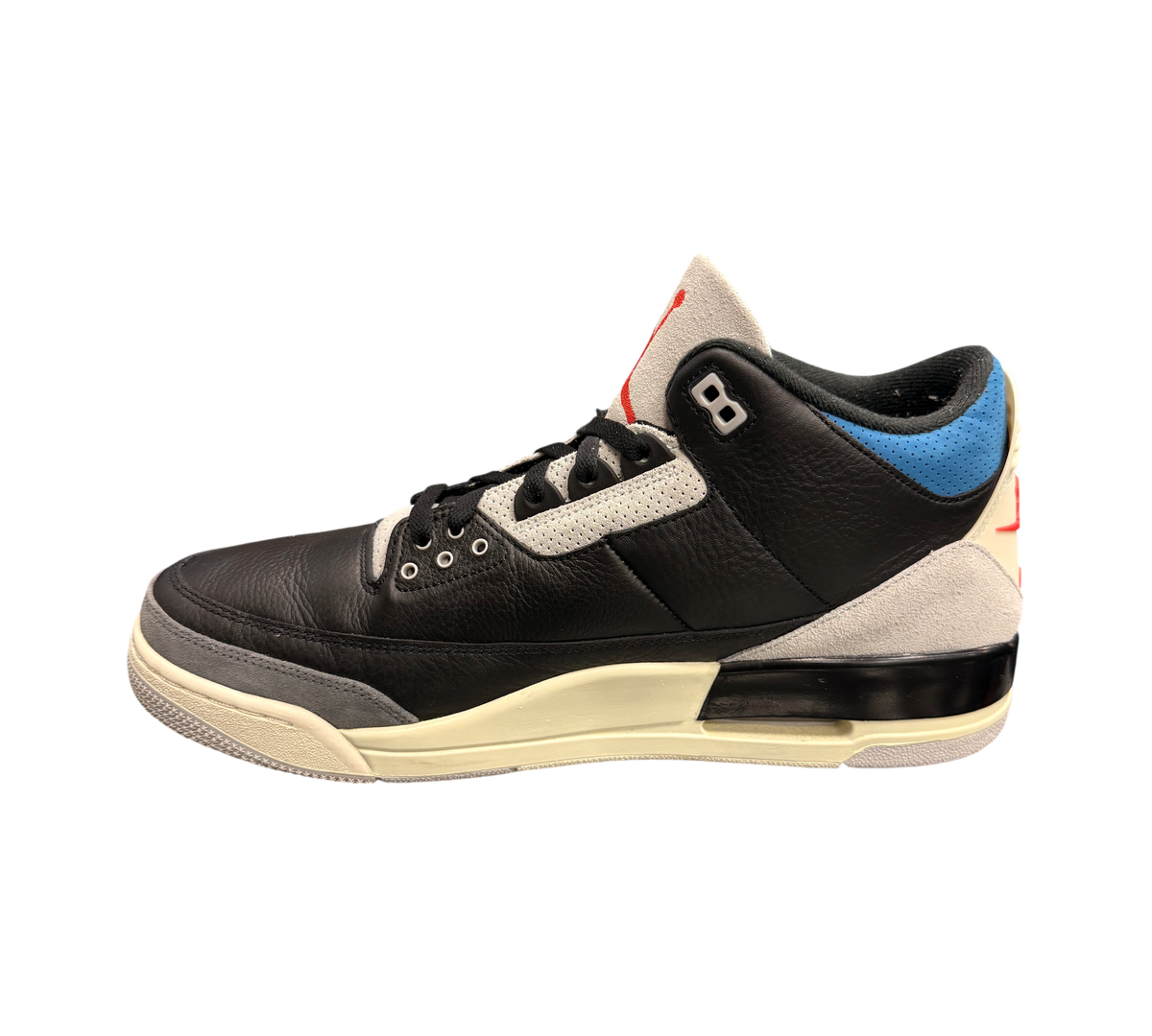 Genesis Boutique Jordan 3 Rare Air sneakers with black leather, grey suede, and blue accents.