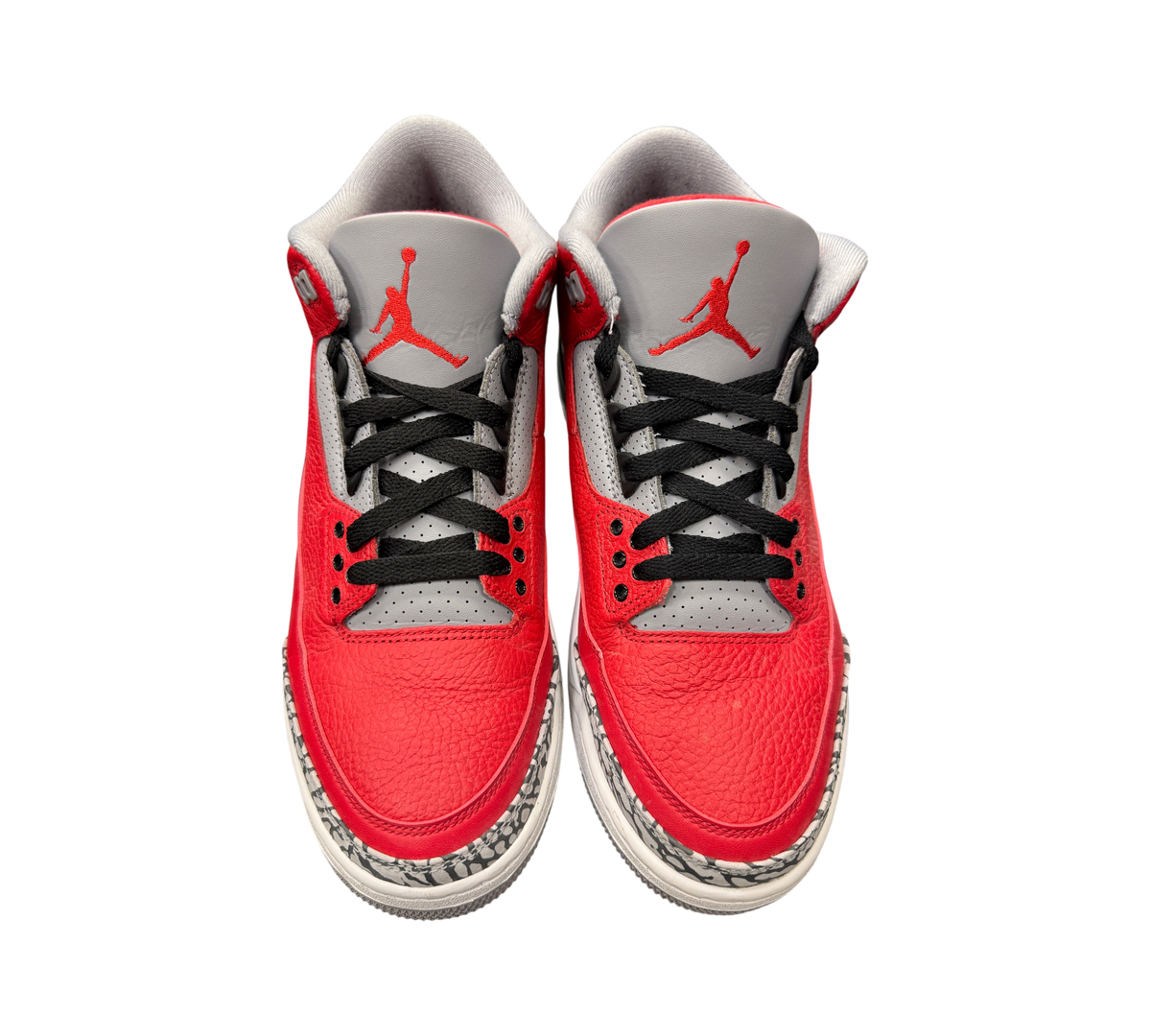 Genesis Boutique pre-owned Jordan 3 Unite Red Cement sneakers with red leather, grey tongues, and elephant print trim.