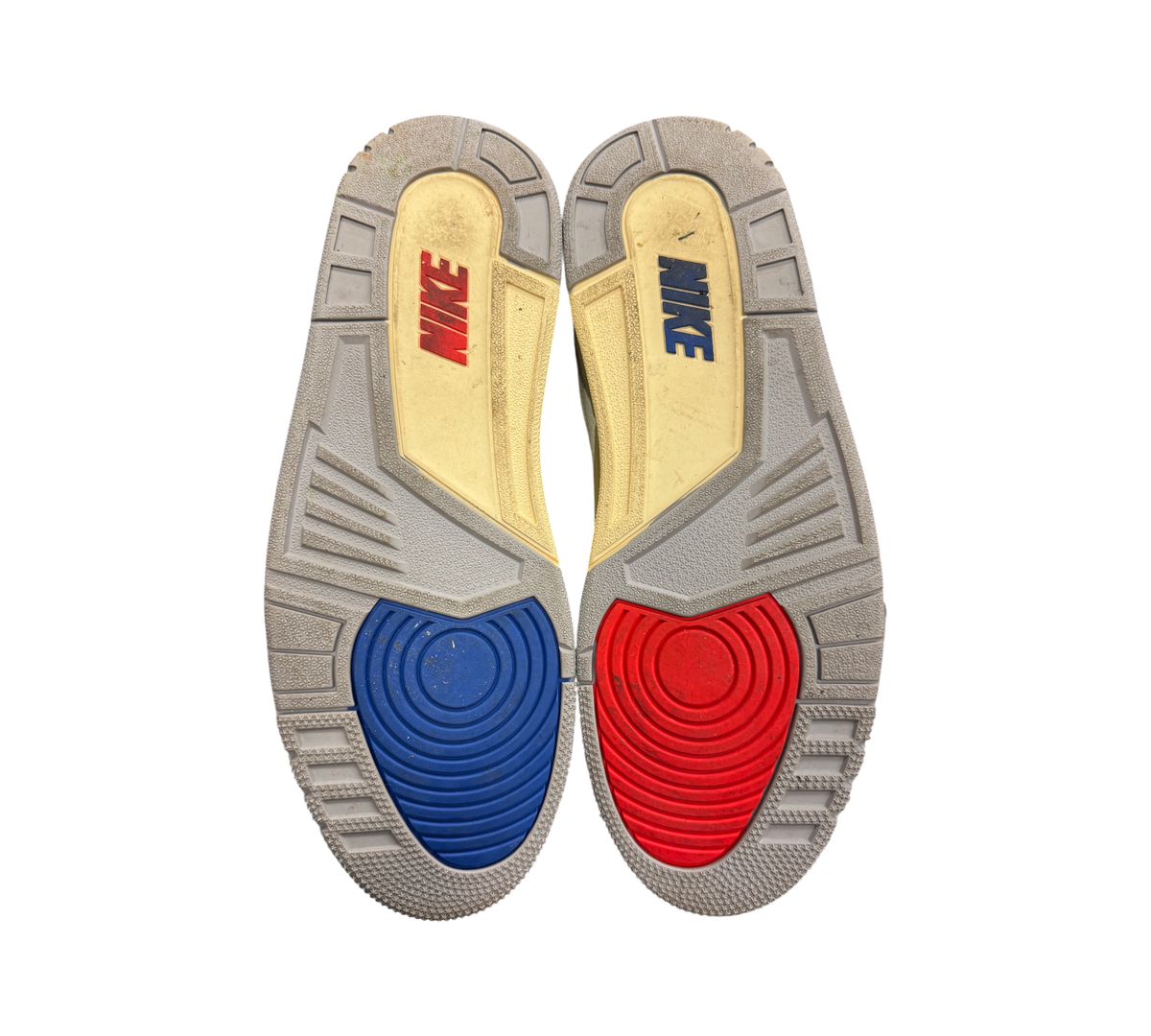 Genesis Boutique Jordan 3 "Seoul 2.0" shoes, showing the soles with red and blue Nike Air cushioning. Used.