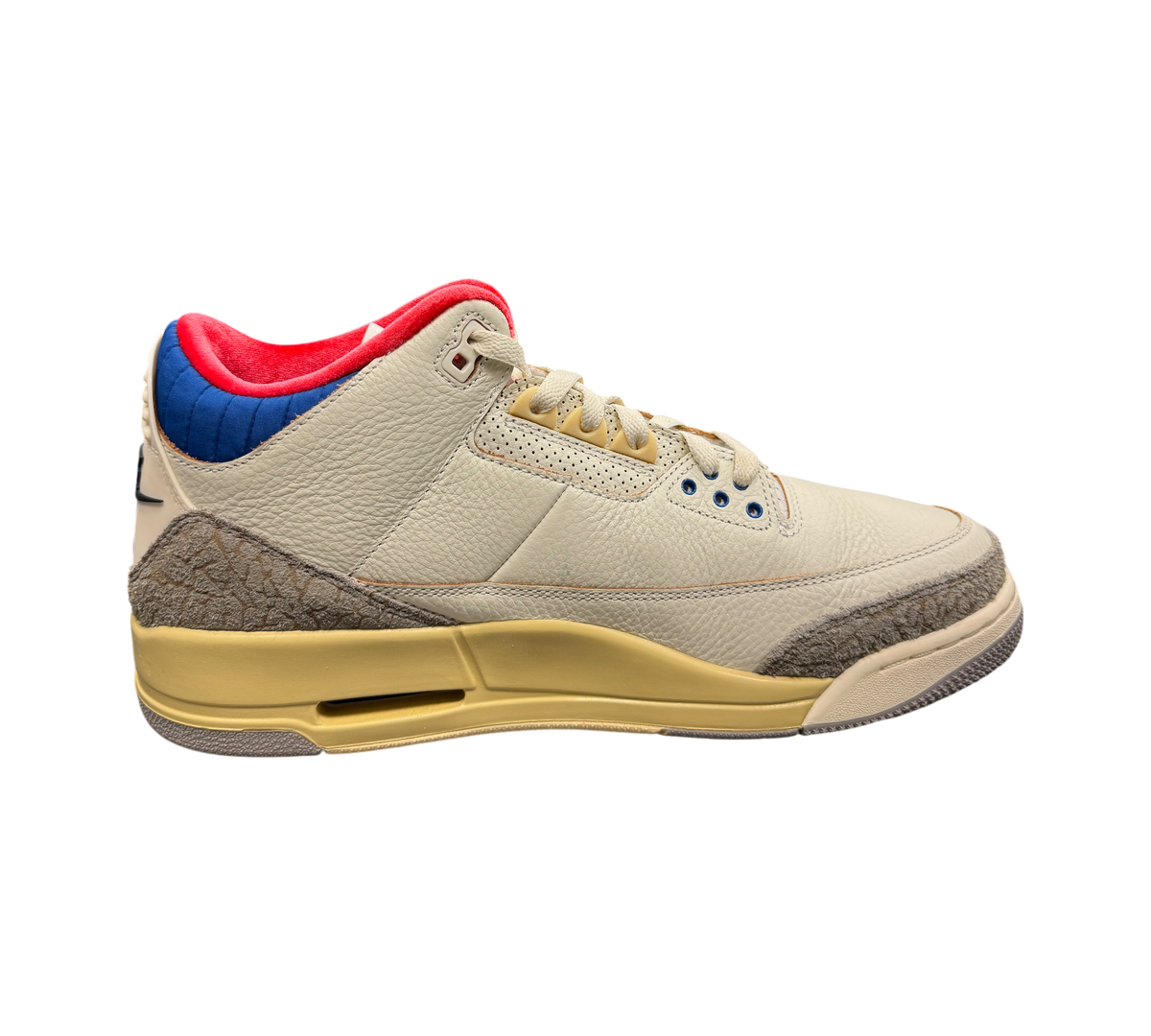Genesis Boutique Jordan 3 "Seoul 2.0" sneakers in off-white leather with red and blue accents and elephant print trim.