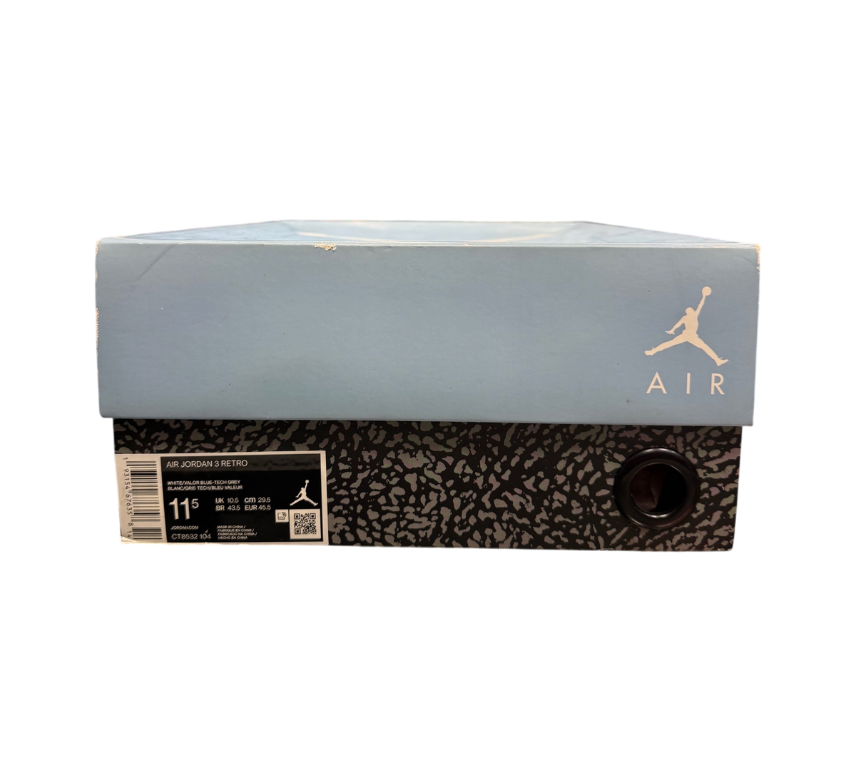 Genesis Boutique Jordan 3 UNC sneaker box in light blue with elephant print base and Jumpman logo on display