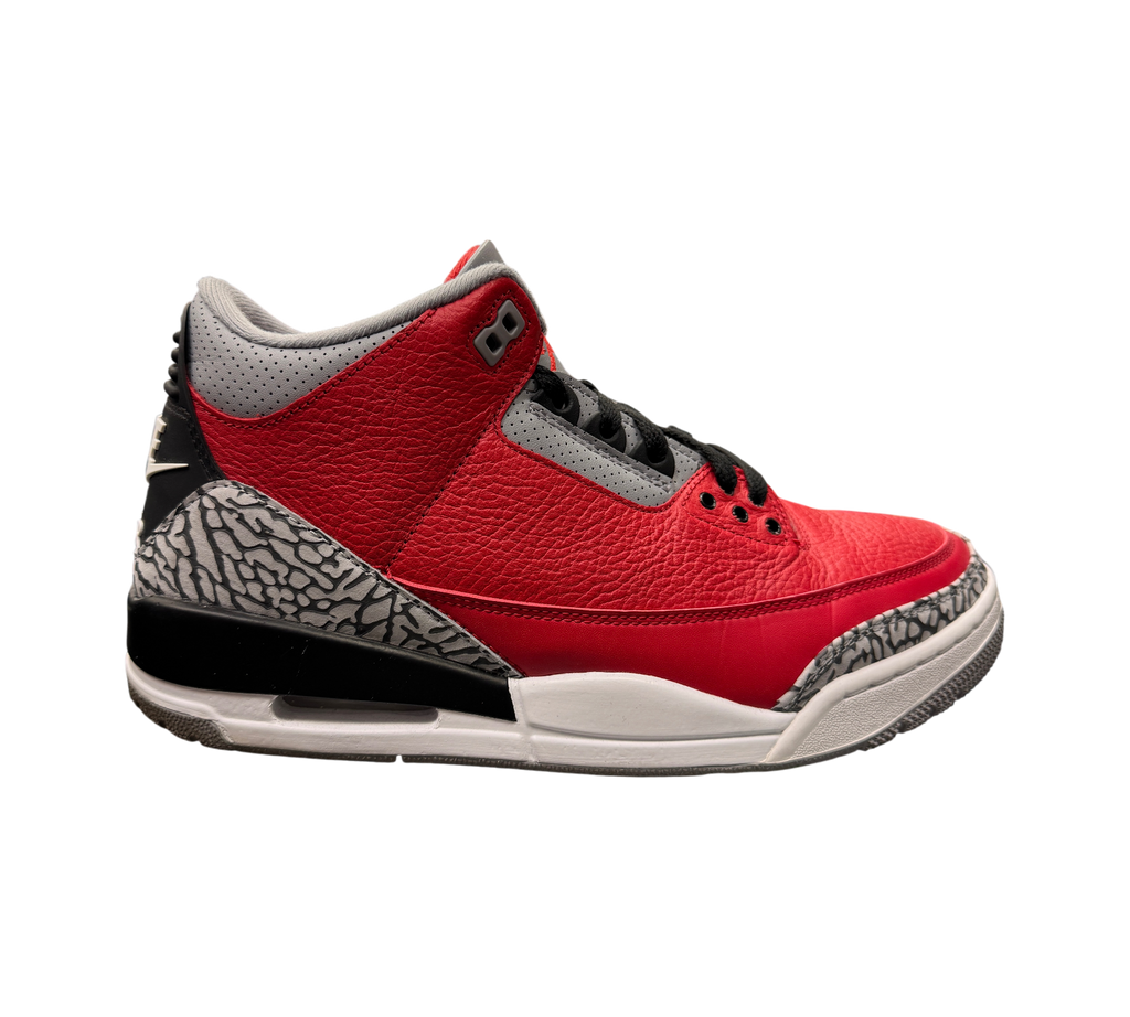 Genesis Boutique Jordan 3 Unite Red Cement sneakers featuring red tumbled leather and iconic grey elephant print.