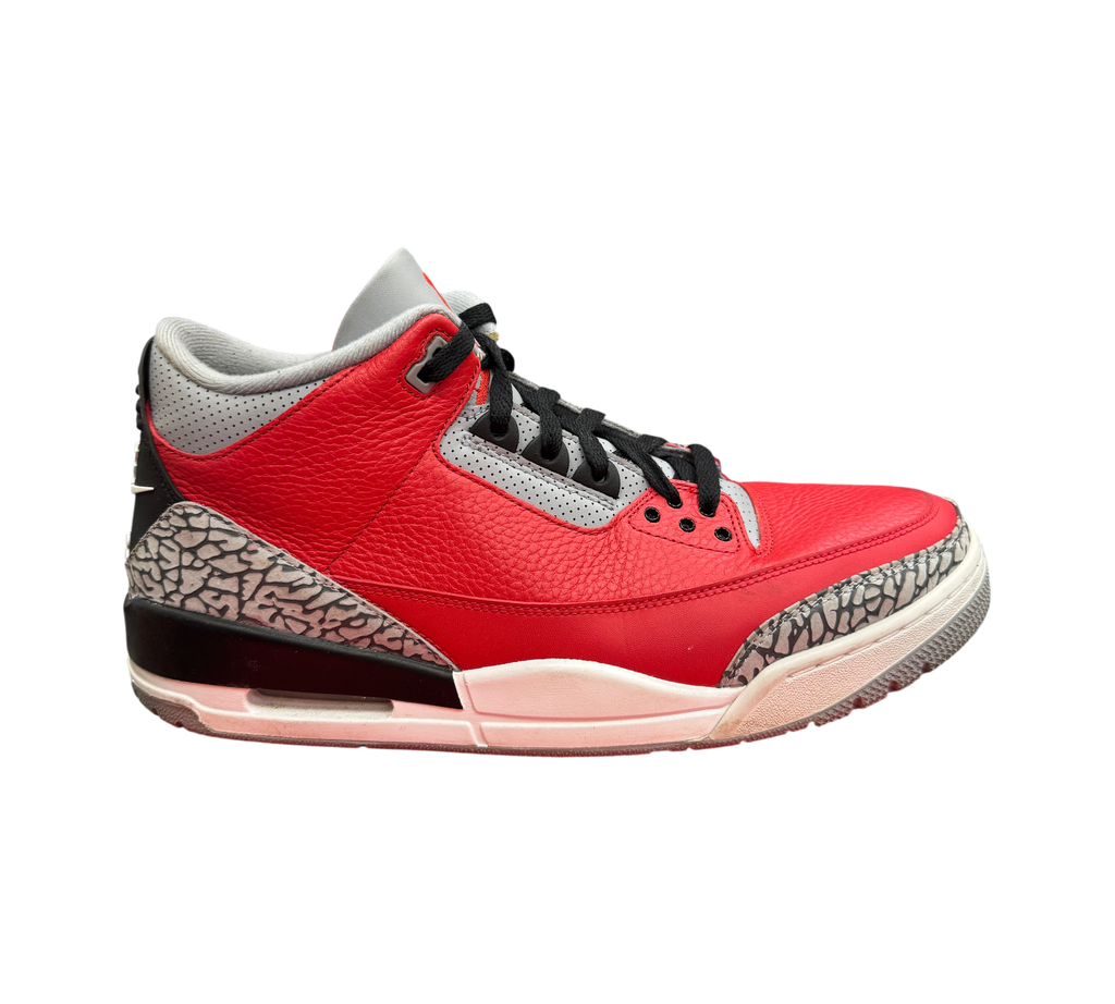 Genesis Boutique Jordan 3 Unite sneakers in red leather with grey elephant print and black accents, side view.