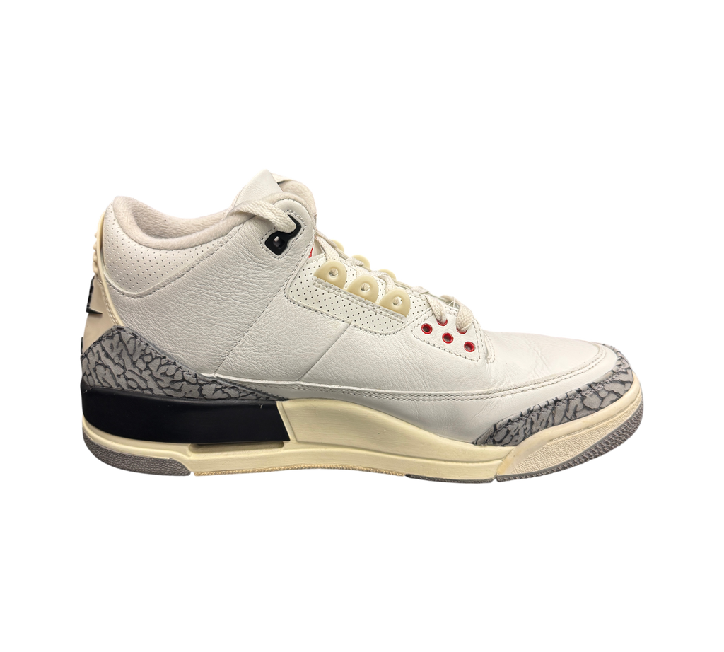 Genesis Boutique pre-owned Jordan 3 White Cement Reimagined sneakers with iconic elephant print and aged midsole.