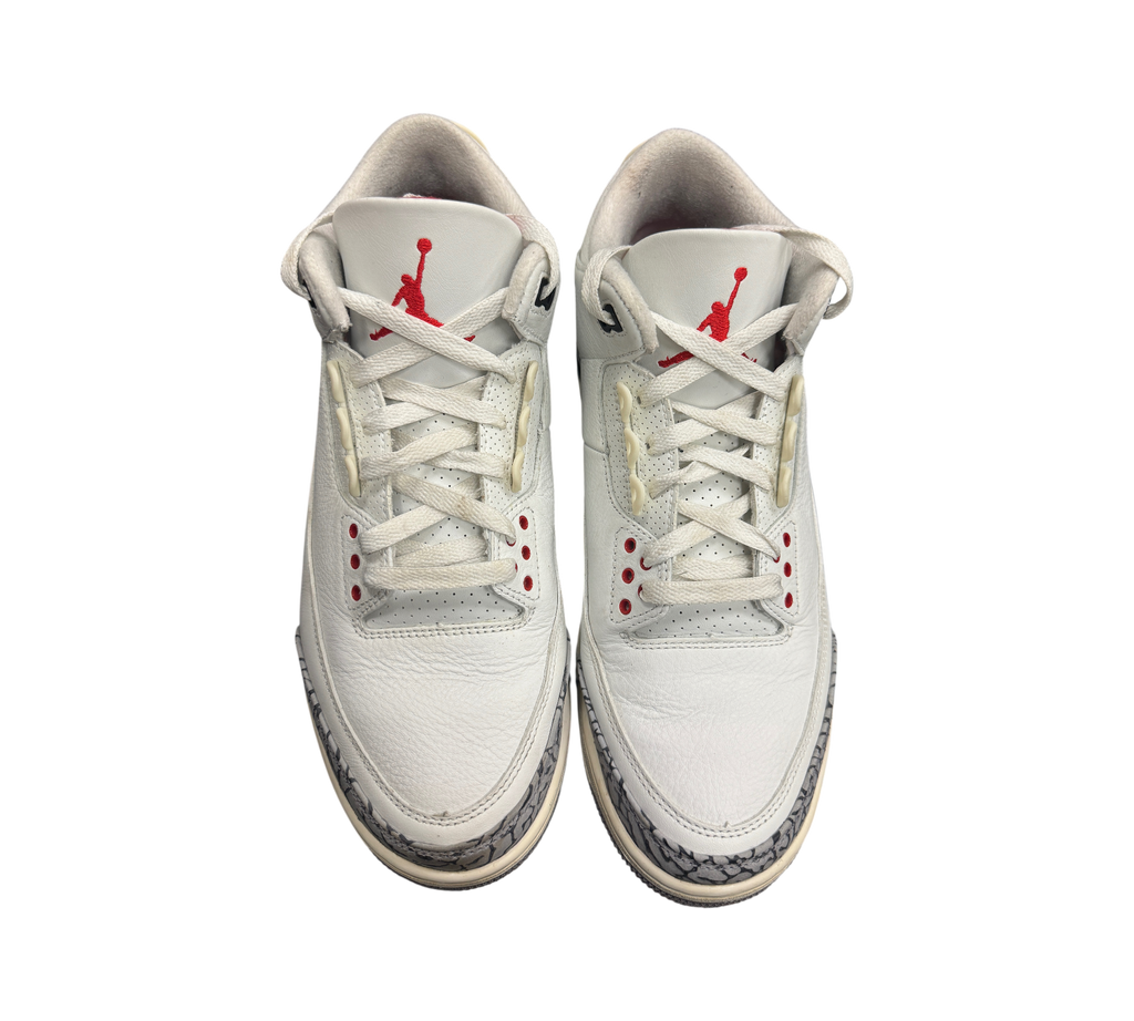 Genesis Boutique Jordan 3 White Cement Reimagined sneakers featuring white leather, red Jumpman logo, and elephant print