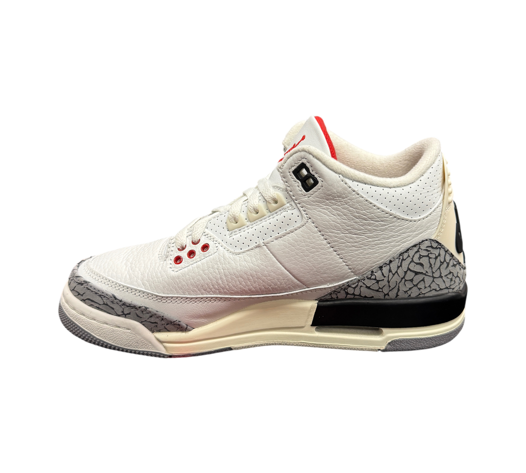 Genesis Boutique Jordan 3 GS White Cement sneakers featuring white leather, iconic elephant print, and red accents.