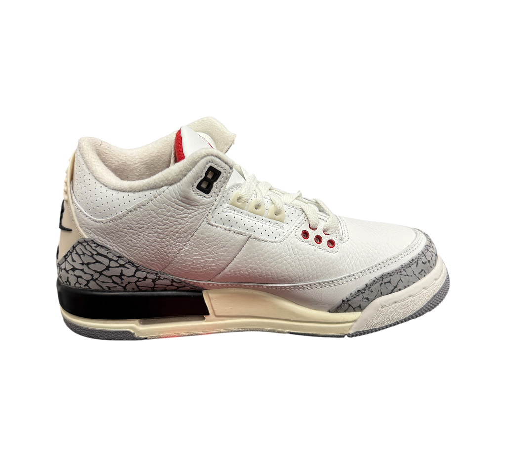 Genesis Boutique Jordan 3 GS White Cement sneakers featuring white leather, grey elephant print, and red accents.