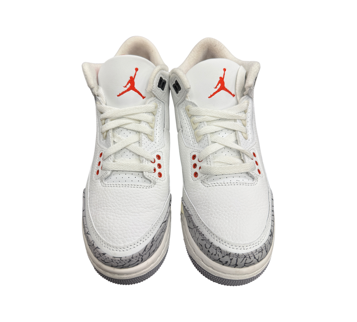 Genesis Boutique Jordan 3 GS White Cement sneakers featuring white leather, iconic grey elephant print, and red accents