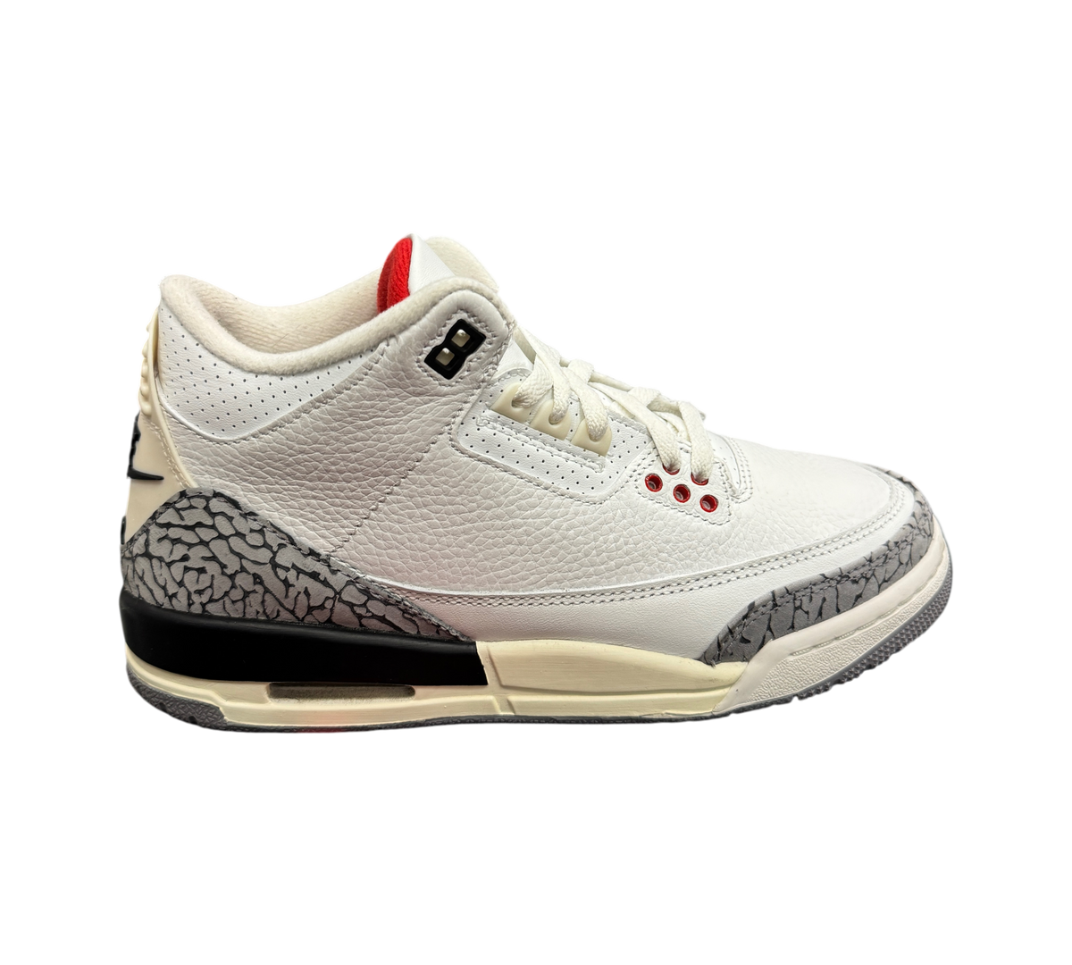 Genesis Boutique Jordan 3 GS White Cement sneakers featuring white leather, iconic grey elephant print, and red accents.