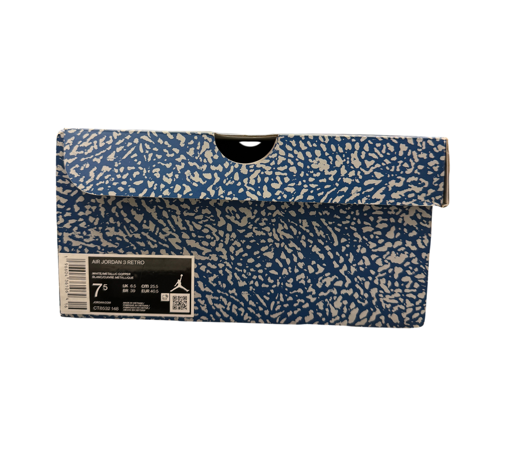 Genesis Boutique Jordan 3 Wizard sneaker box with blue and white elephant print pattern on a retail store counter