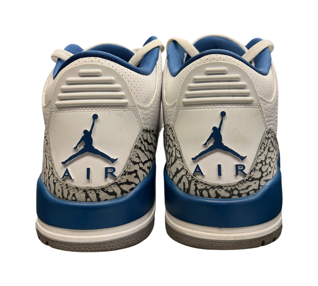 Genesis Boutique used Jordan 3 Wizards sneakers featuring white leather, blue accents, and iconic elephant print heel.