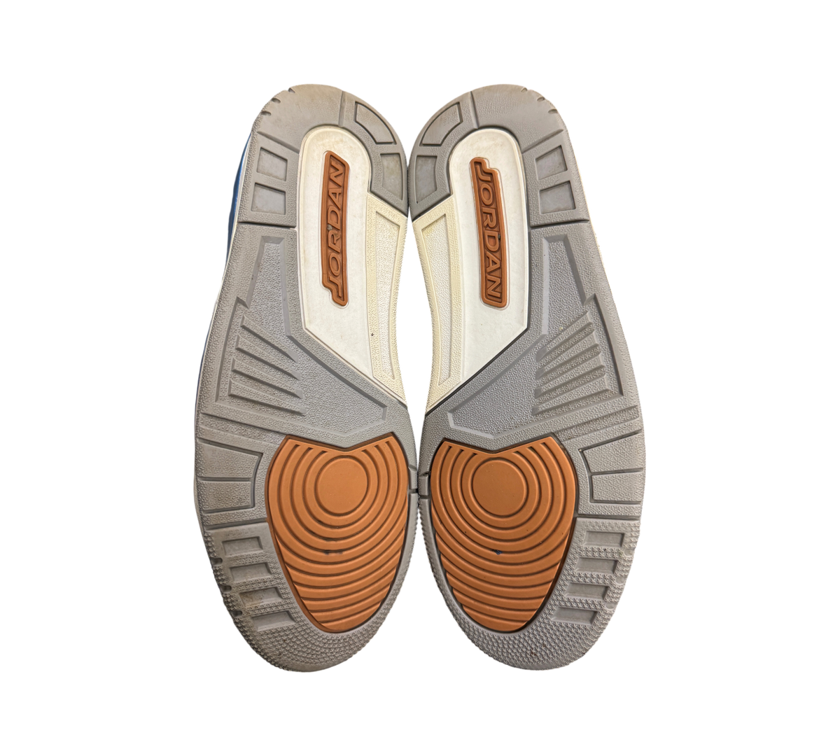 Genesis Boutique used Jordan 3 Wizards sneakers showing grey, white, and orange rubber outsoles with Jordan branding.