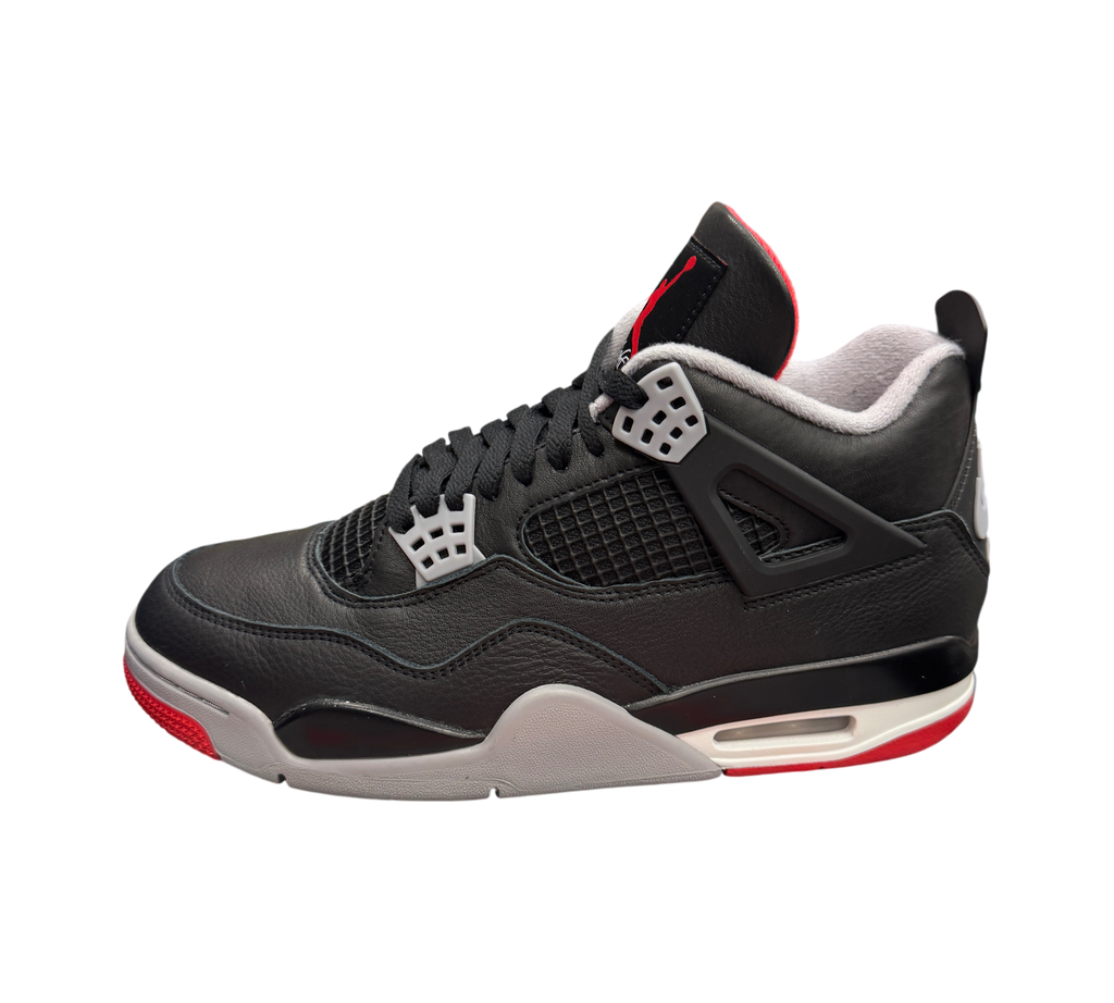 Genesis Boutique Jordan 4 Bred Reimagined sneakers in black leather with grey and red accents on a branded shoebox.