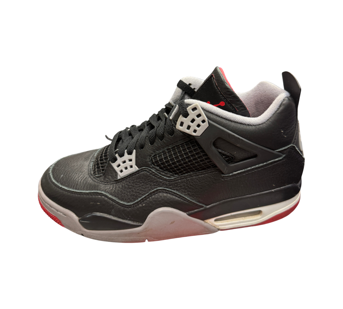 Genesis Boutique pre-owned Jordan 4 Bred Reimagined sneakers in black leather with grey and red accents on a box
