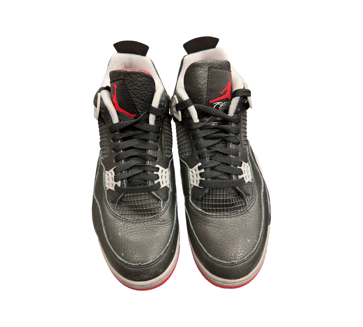 Genesis Boutique pre-owned Jordan 4 Bred Reimagined sneakers in black tumbled leather with red Jumpman logo accents.