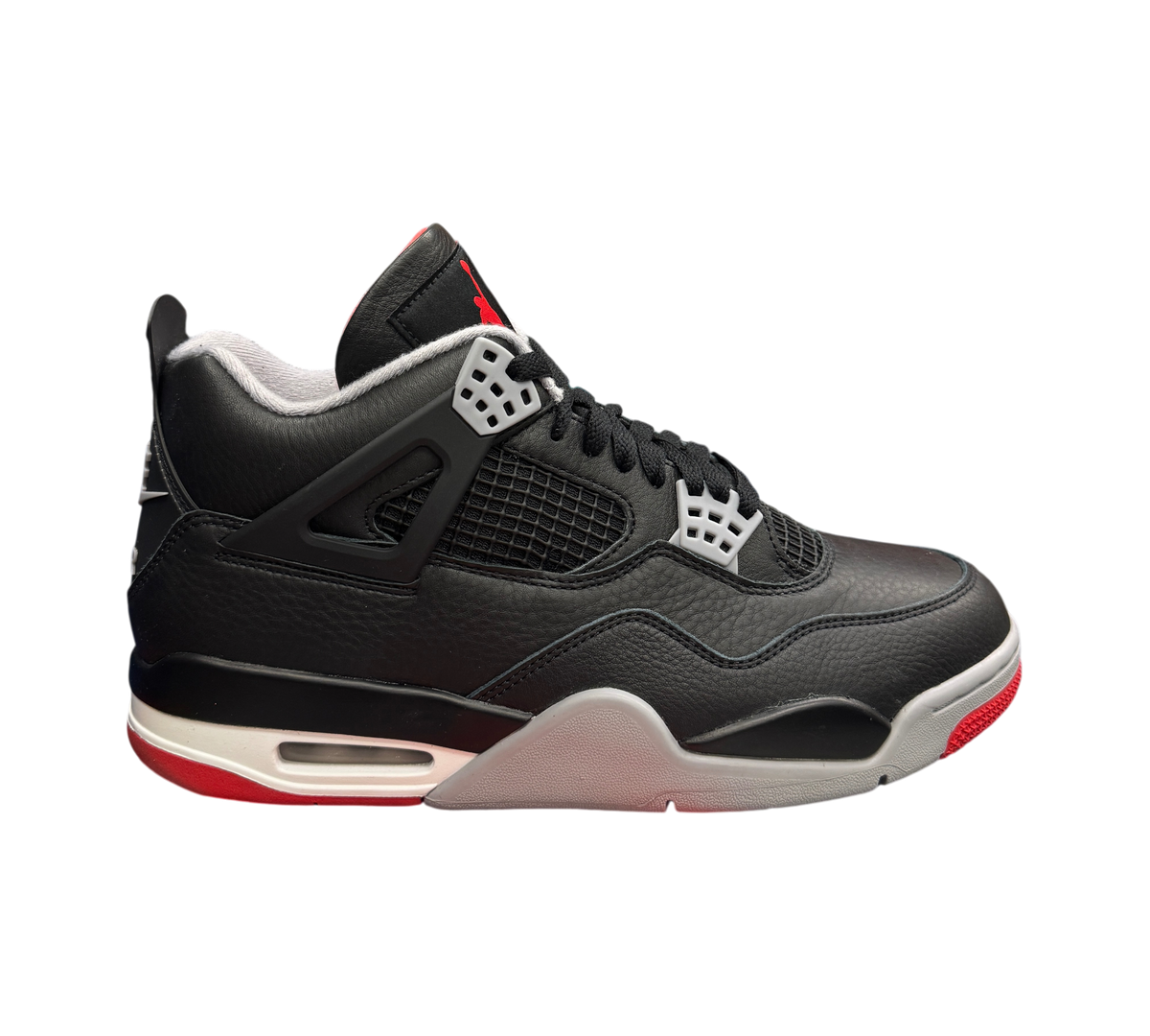 Genesis Boutique Jordan 4 Bred Reimagined sneakers in black leather with grey and red accents on a branded shoebox