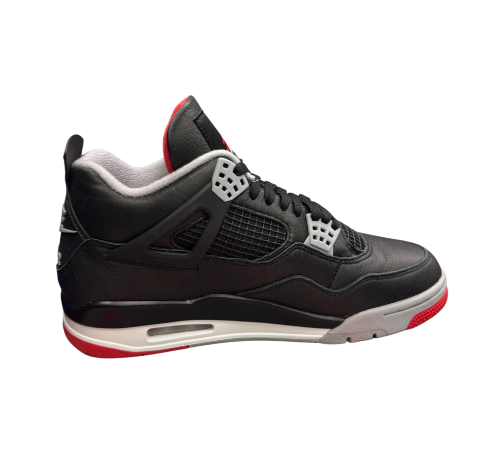 Genesis Boutique Jordan 4 Bred Reimagined sneakers in black leather with red and grey accents on a branded shoebox