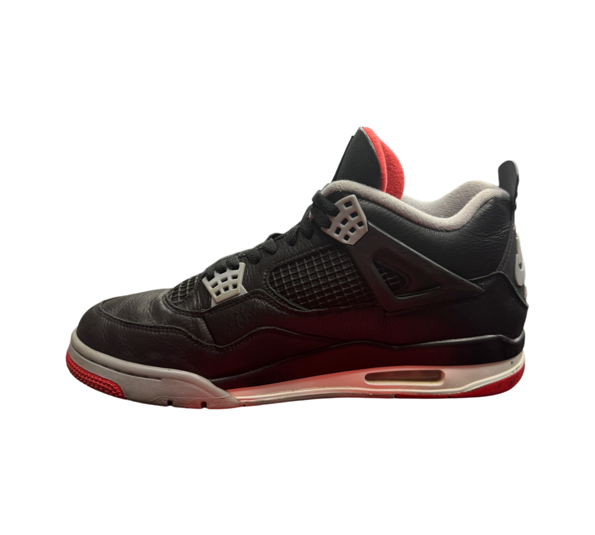 Genesis Boutique Jordan 4 Bred Reimagined sneakers in black leather with red accents and white midsole side view