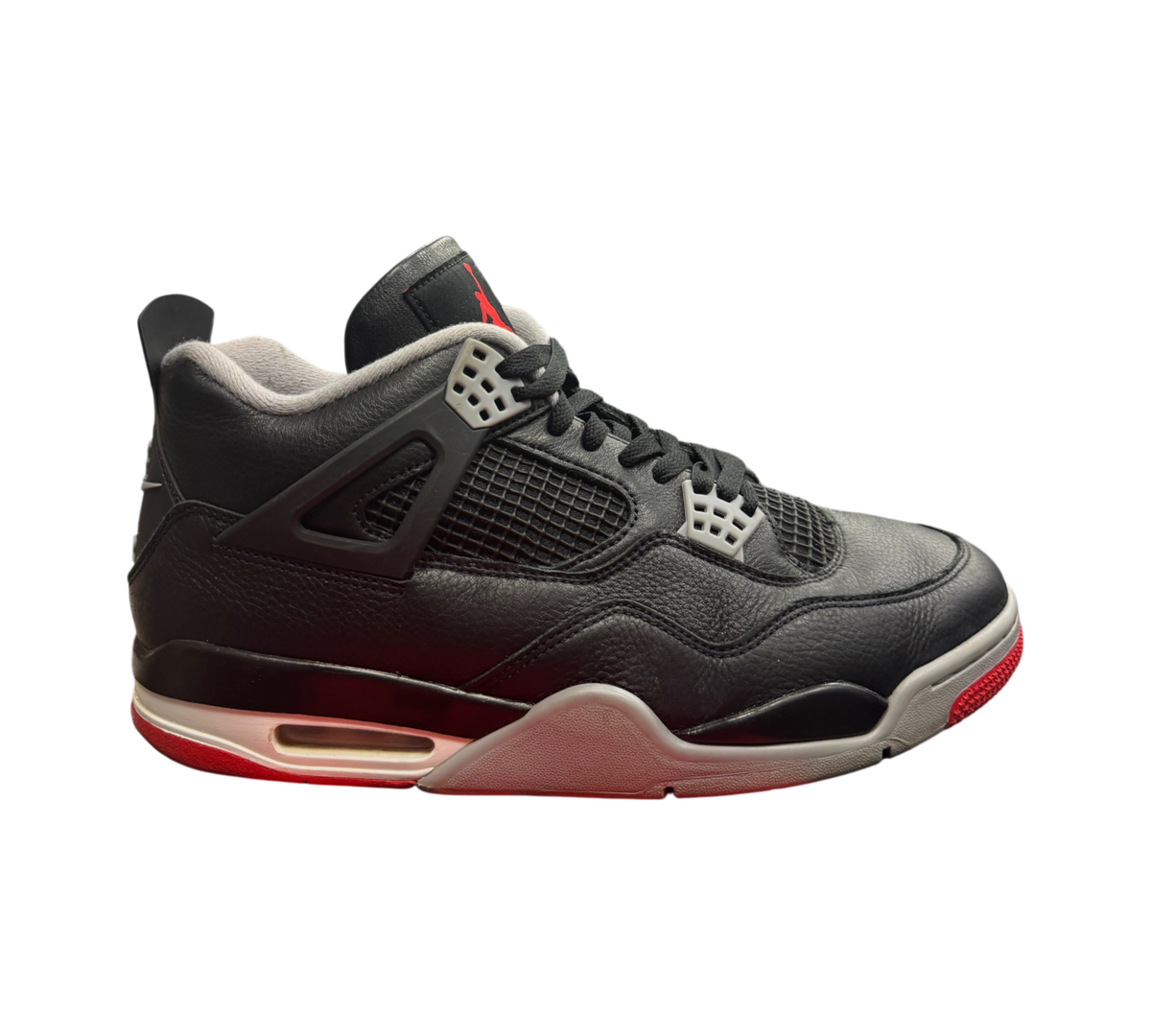 Genesis Boutique Jordan 4 Bred Reimagined sneakers in black leather with red accents and grey detailing