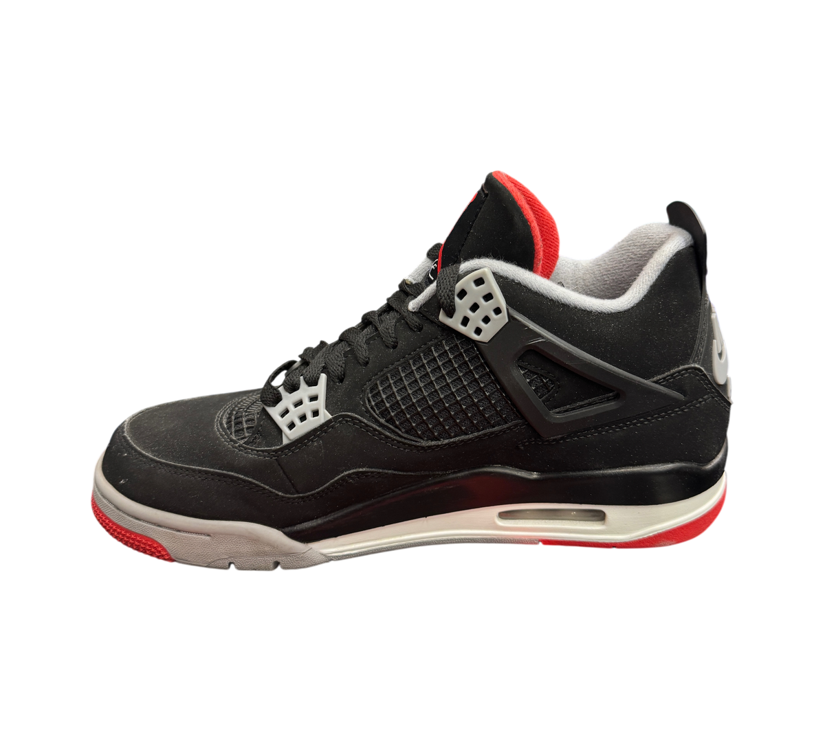 Genesis Boutique Jordan 4 2019 Bred sneakers in black nubuck with red and grey accents, side profile view.