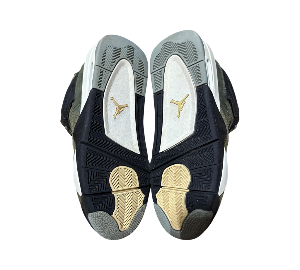 Genesis Boutique used Jordan 4 GS Craft Olive sneakers showing the textured rubber outsoles with Jumpman branding