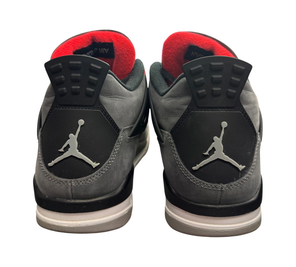 Genesis Boutique used Jordan 4 Infrared sneakers showing grey nubuck heels with Jumpman logos and red inner lining