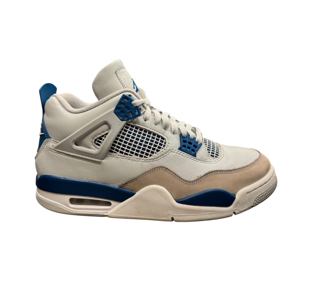 Genesis Boutique Jordan 4 Military Blue sneakers in white, grey, and blue leather displayed on a glass store counter.