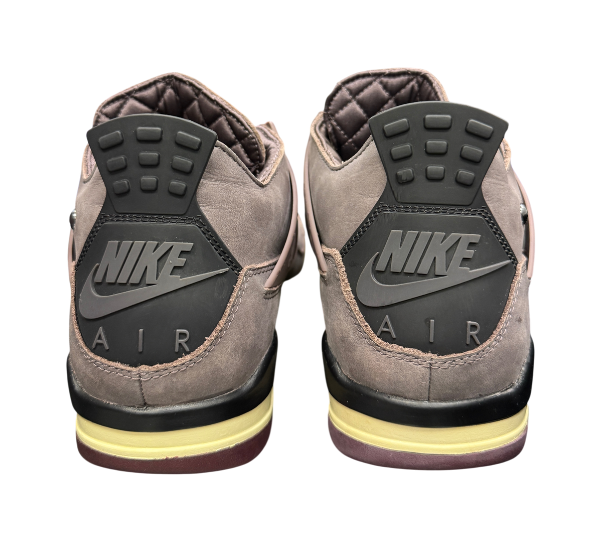 Genesis Boutique Jordan 4 A Ma Maniere Violet Ore sneakers showing the back heel tabs with Nike Air branding