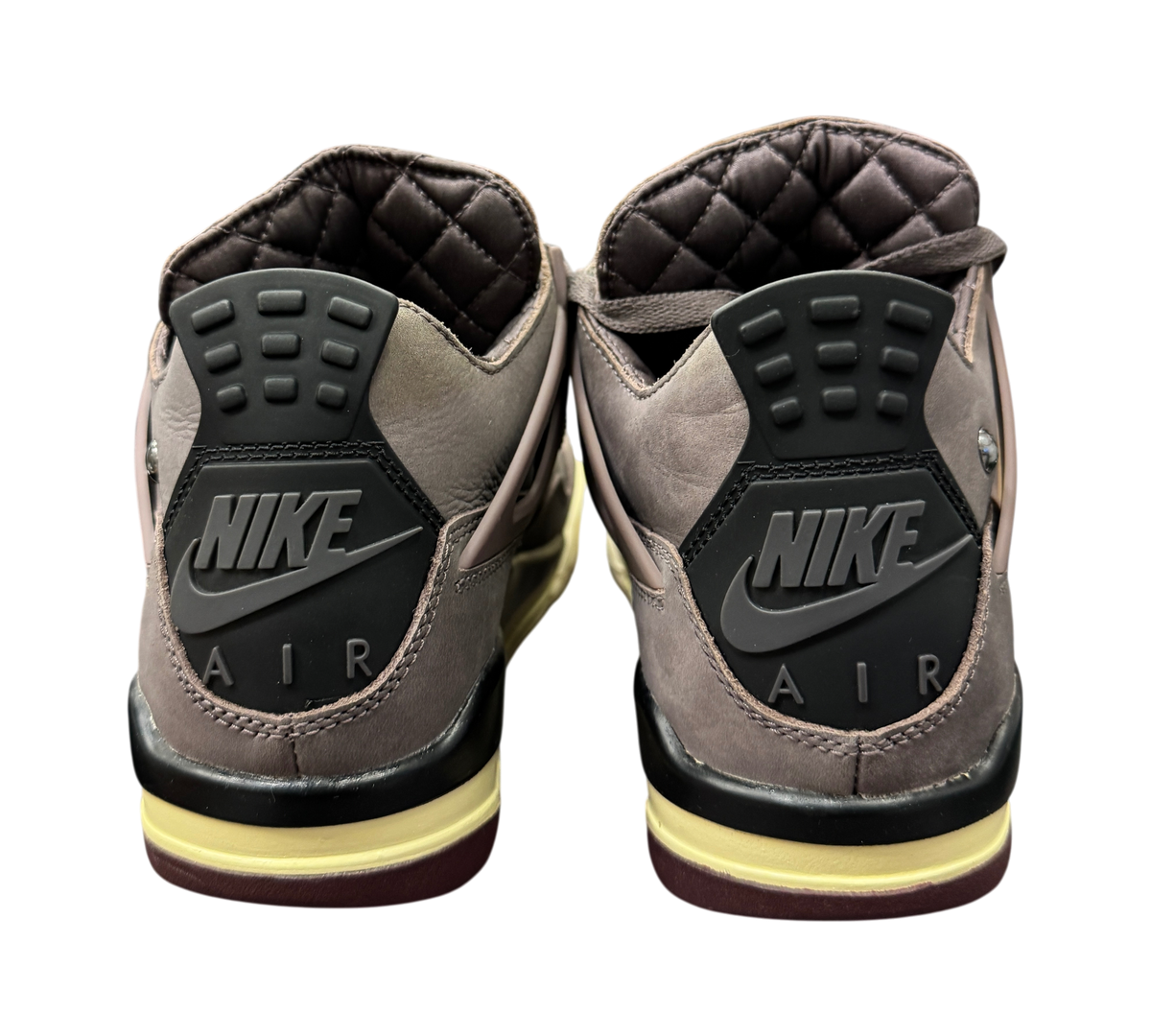 Genesis Boutique Jordan 4 A Ma Maniere Violet Ore sneakers showing the rear view with Nike Air branding and quilted lining