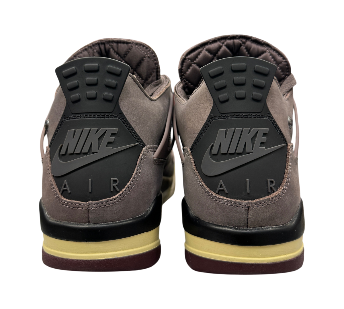 Genesis Boutique Jordan 4 A Ma Maniere Violet Ore sneakers, rear view showing Nike Air branding and quilted lining.