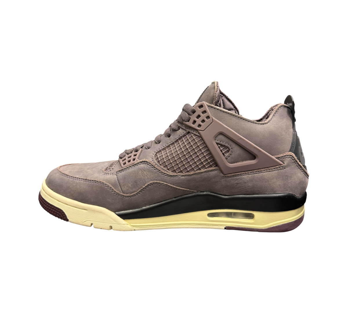 Genesis Boutique Jordan 4 A Ma Maniere Violet Ore sneaker in premium mauve suede with a cream and burgundy midsole.