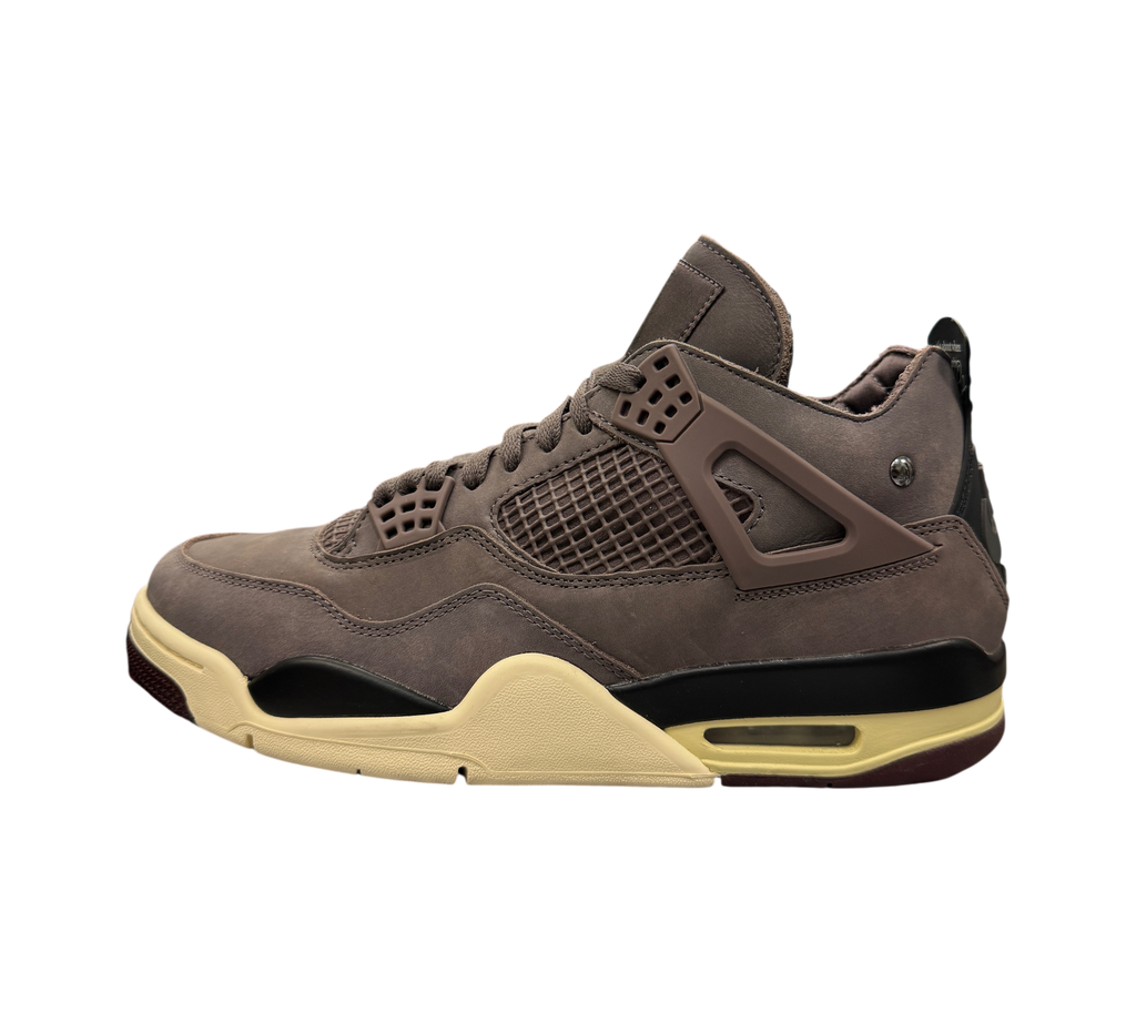Genesis Boutique Jordan 4 A Ma Maniere Violet Ore sneakers in muted purple suede with cream and black midsole details.