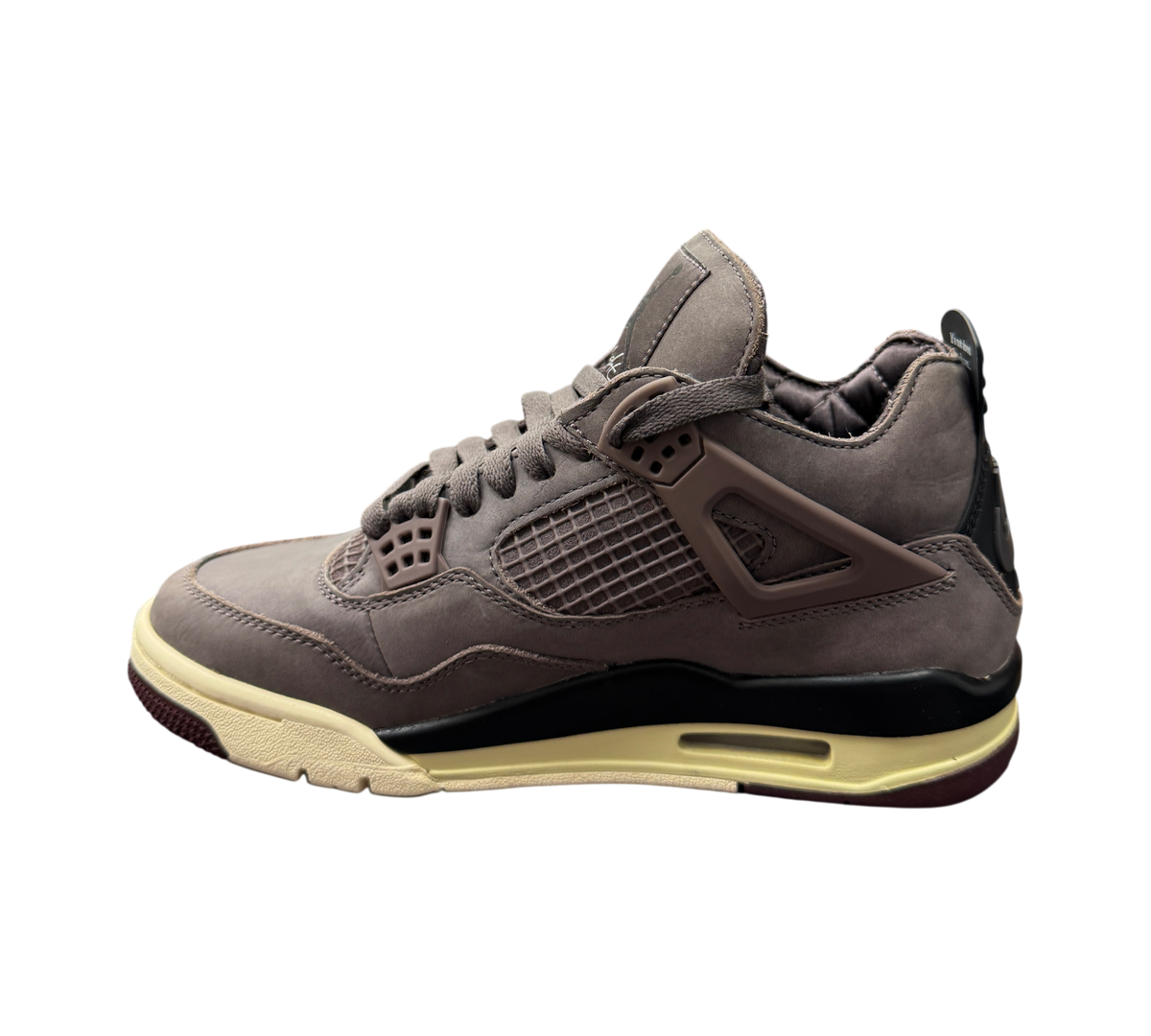 Genesis Boutique Jordan 4 A Ma Maniere Violet Ore sneakers in premium dark purple suede with cream and black accents.