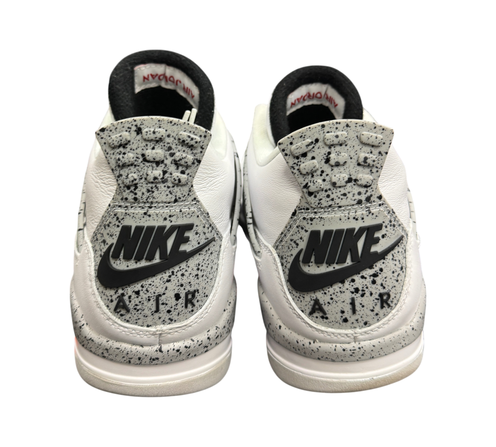 Genesis Boutique Jordan 4 2016 White Cement sneakers showing the grey speckled heel tabs with Nike Air branding.
