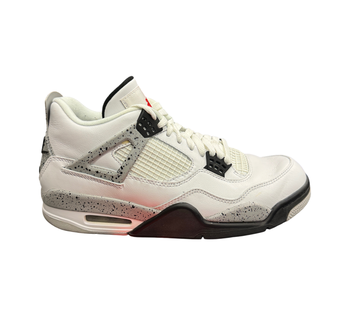 Genesis Boutique Jordan 4 White Cement sneakers featuring white leather, grey speckled accents, and black detailing.