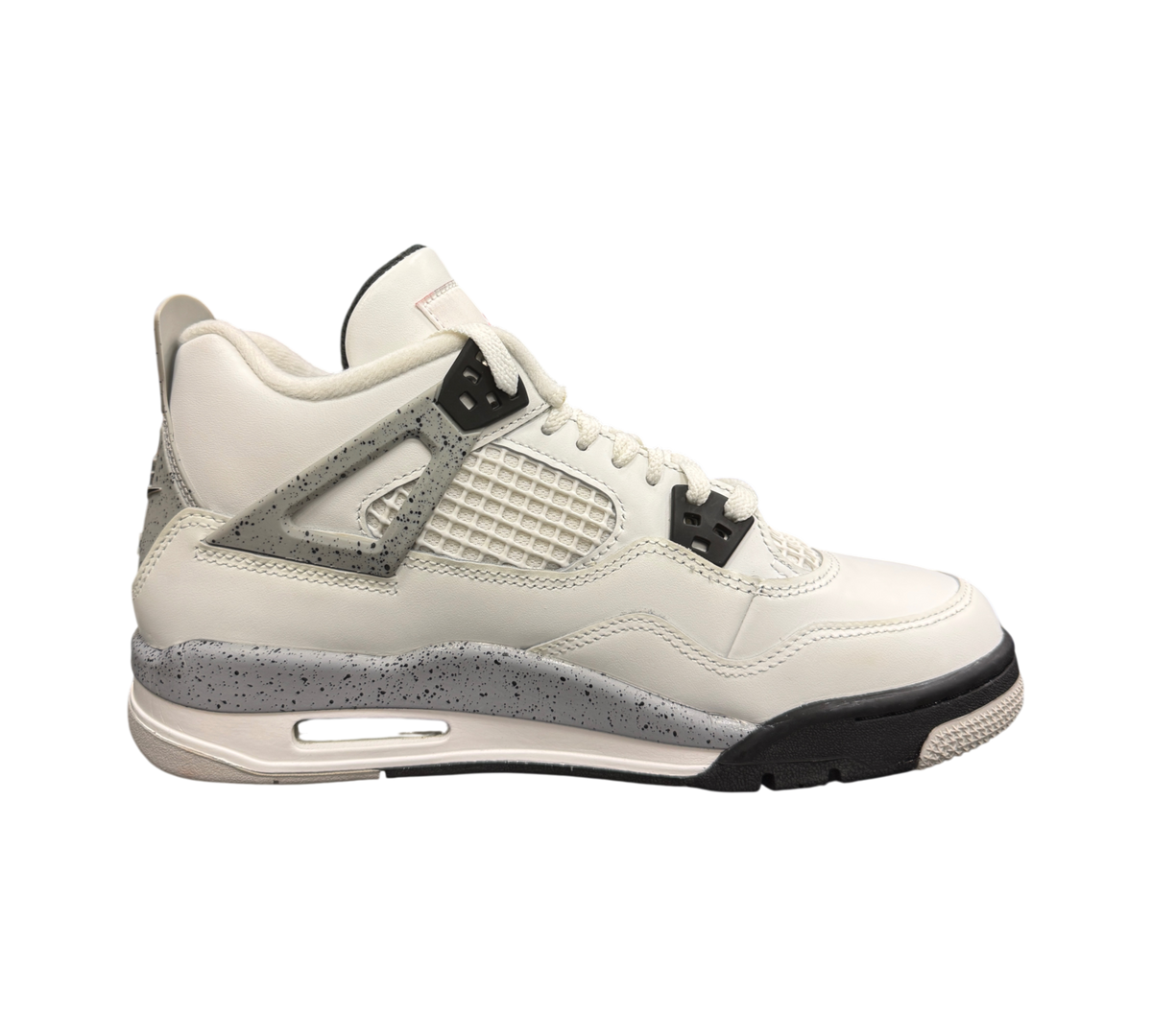 Genesis Boutique Jordan 4 GS White Cement 2025 sneakers featuring white leather and iconic grey speckled accents.
