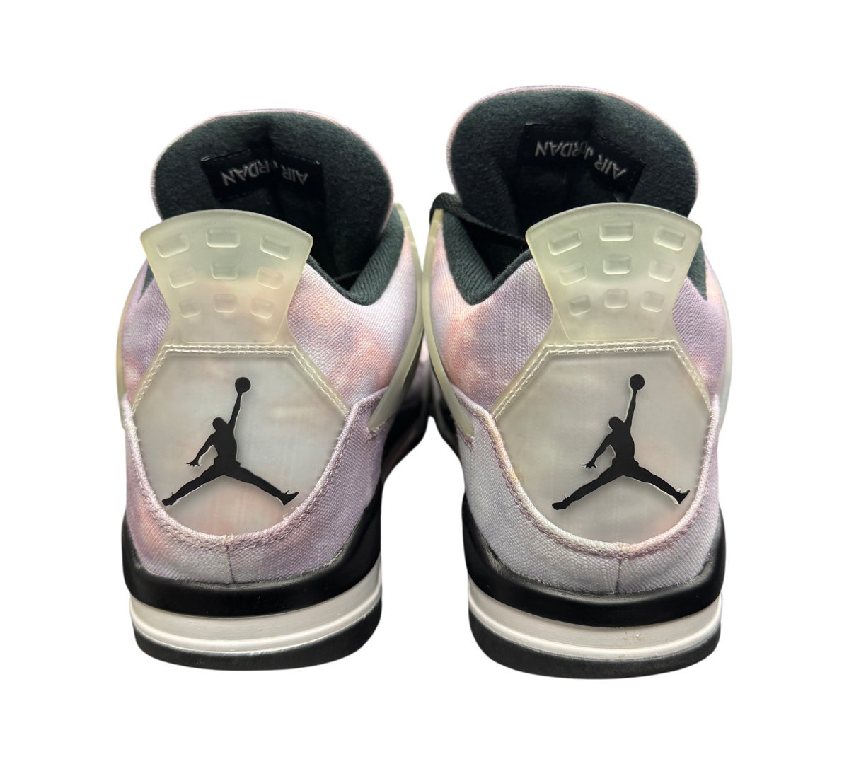 Genesis Boutique Jordan 4 Zen Master sneakers showing the rear view with translucent heel tabs and Jumpman logos.