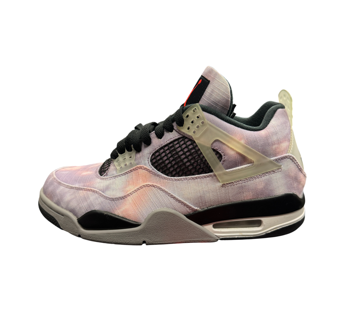 Genesis Boutique Jordan 4 Zen Master sneaker featuring a purple and pink tie-dye canvas upper with black accents.
