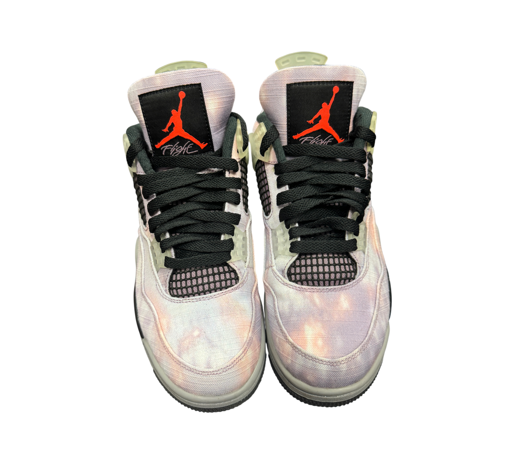 Genesis Boutique Jordan 4 Zen Master sneakers featuring a tie-dye canvas upper with black accents and red Jumpman logo