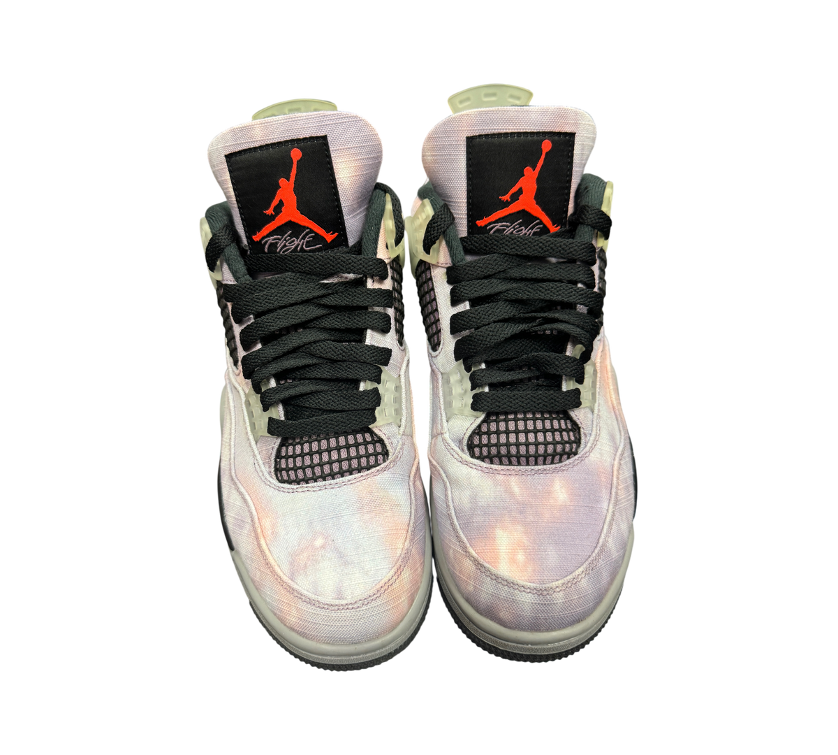 Genesis Boutique Jordan 4 Zen Master sneakers featuring a tie-dye canvas upper with black accents and red Jumpman logo