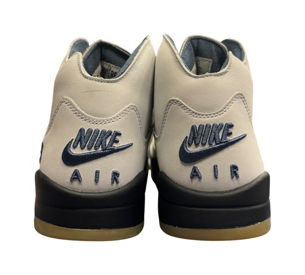 Genesis Boutique Jordan 5 A Ma Maniere Dawn sneakers showing the rear heel view with navy Nike Air embroidery