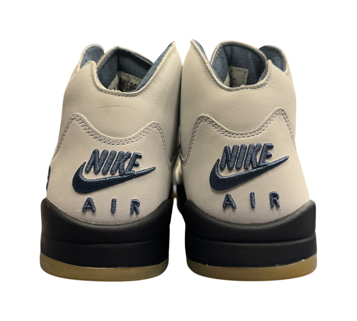 Genesis Boutique Jordan 5 A Ma Maniere Dawn sneakers showing the rear heel view with navy Nike Air embroidery
