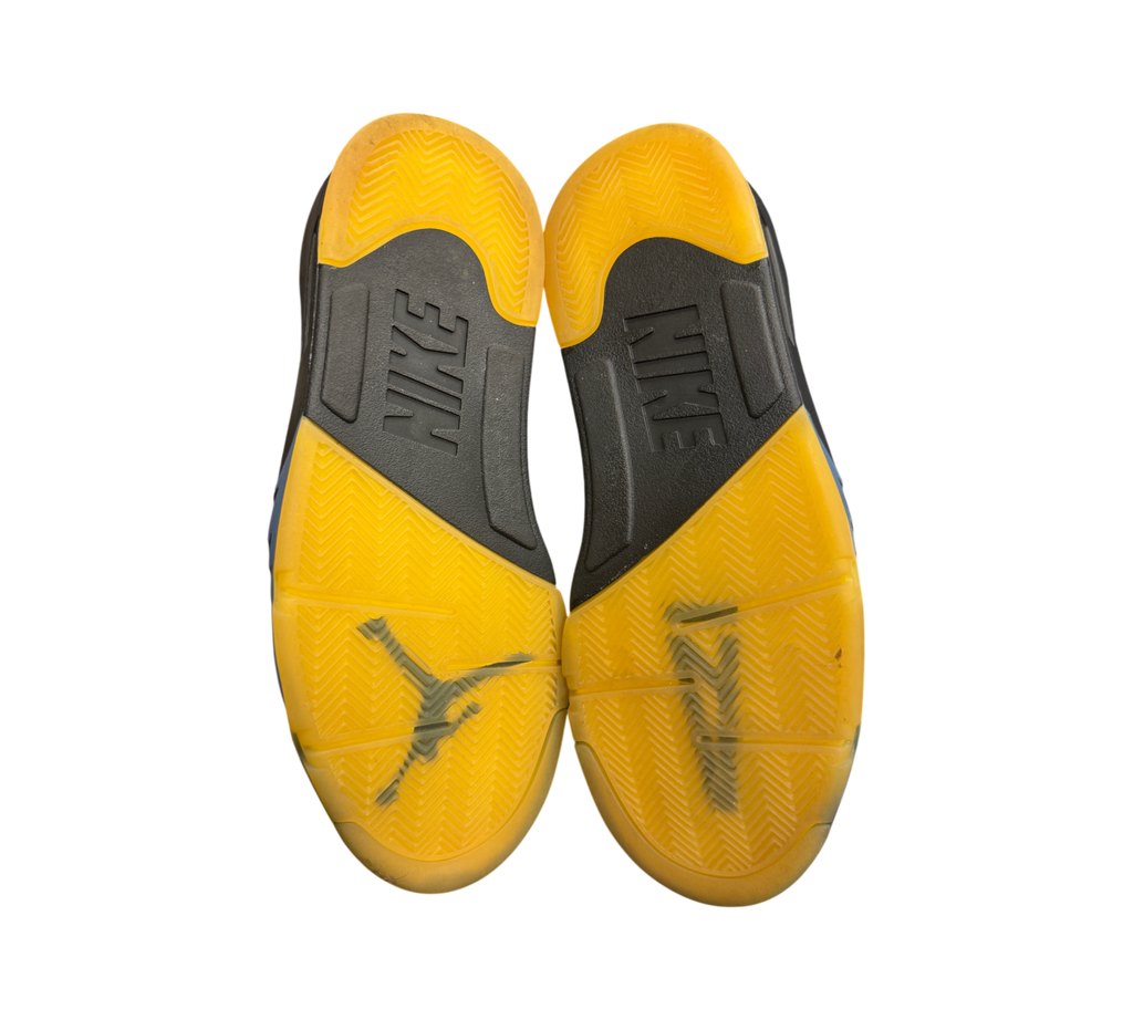 Genesis Boutique Jordan 5 A Ma Maniere Dawn sneakers showing the yellow translucent and black rubber outsoles