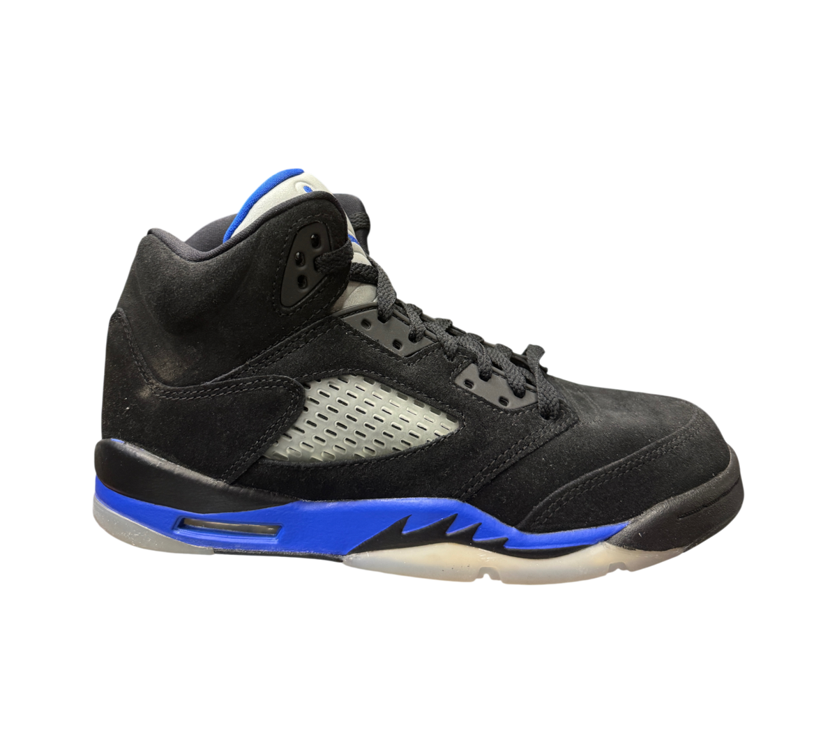 Genesis Boutique Jordan 5 GS Racer Blue sneakers in black suede with blue midsole accents and translucent outsole