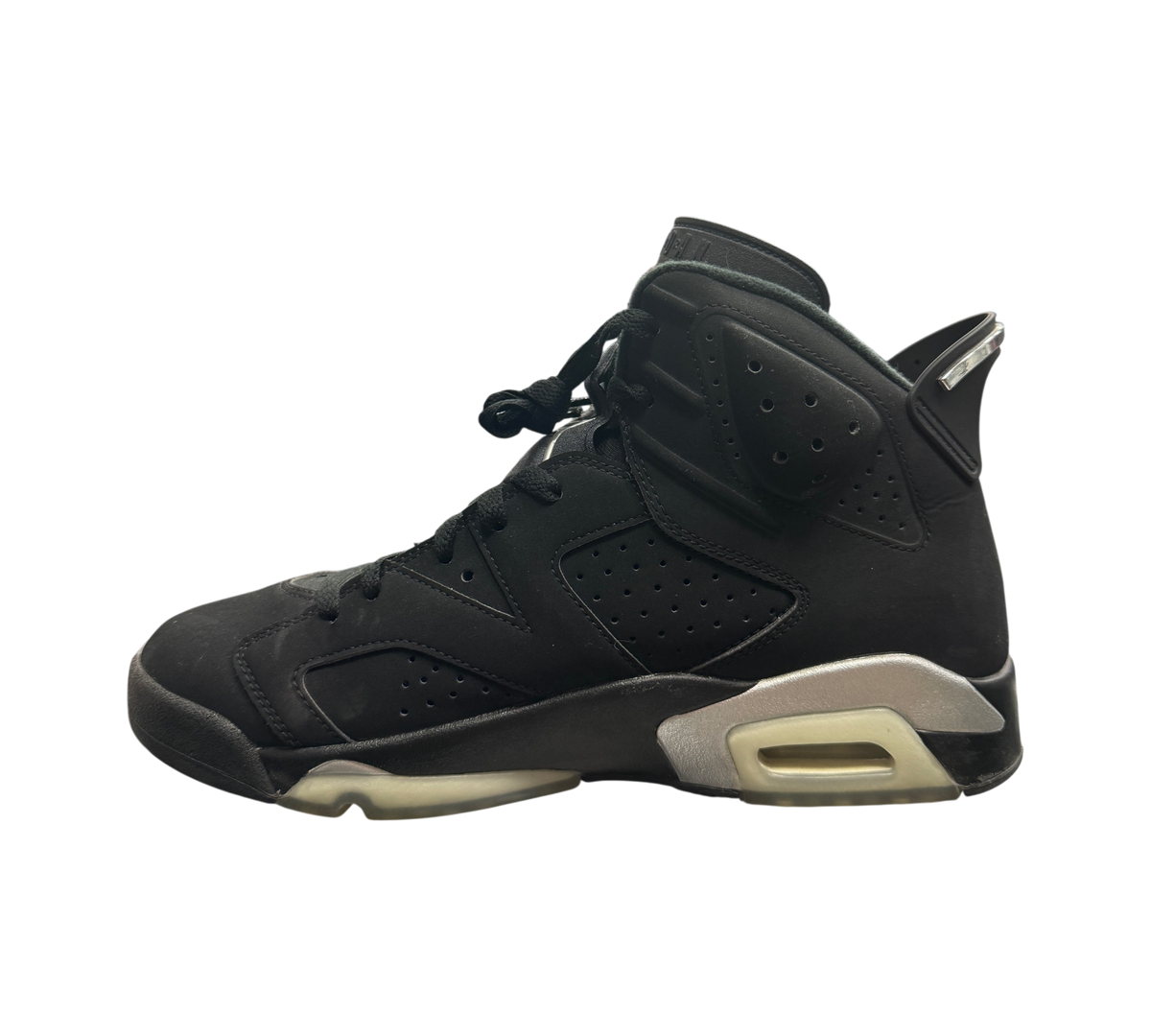 Genesis Boutique Jordan 6 Chrome sneaker in black nubuck with metallic silver accents on a glass display counter