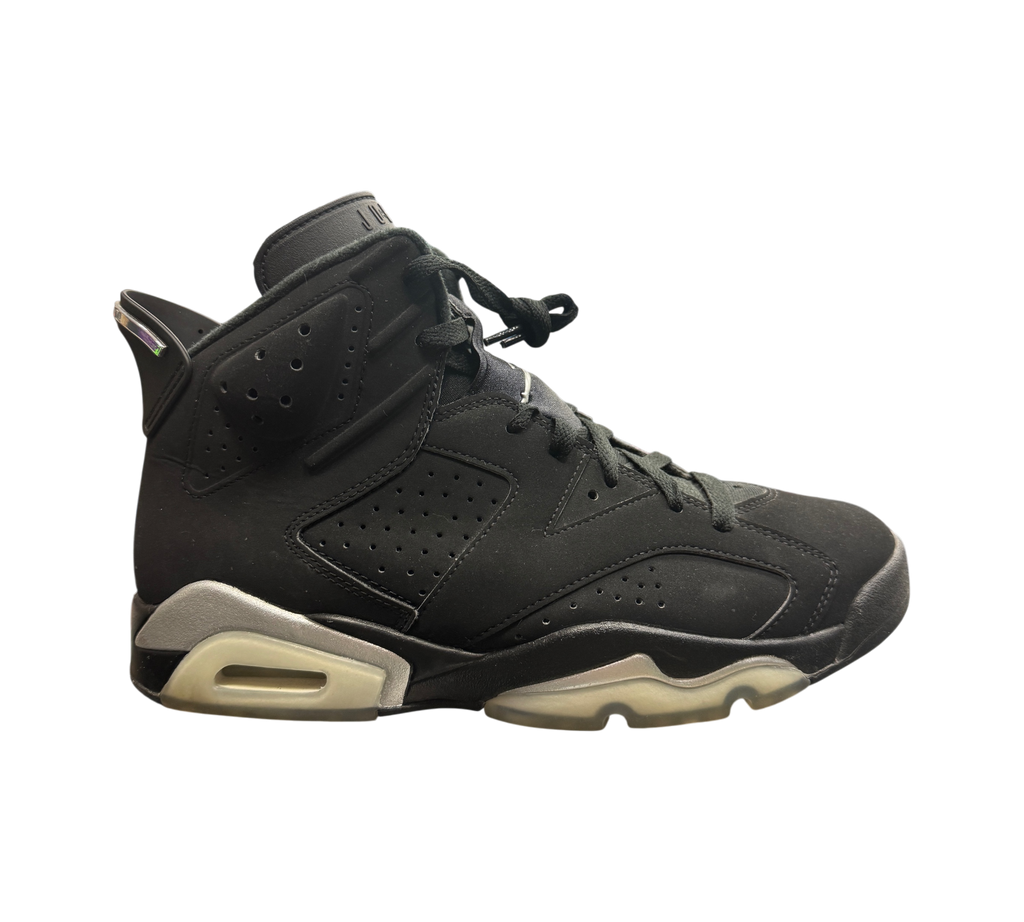 Genesis Boutique Jordan 6 Chrome sneakers in black nubuck with metallic silver accents on a glass display shelf
