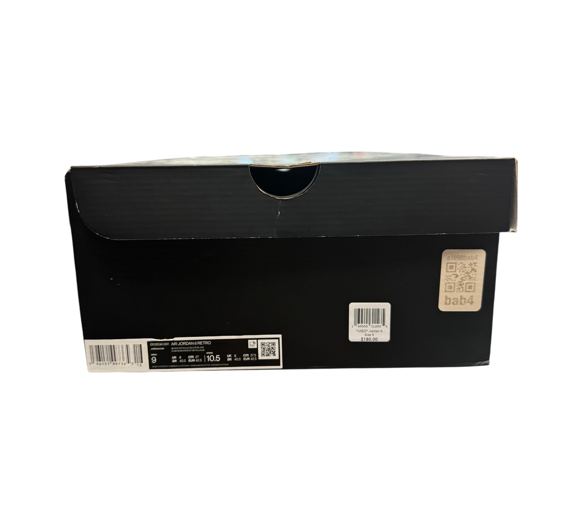 Genesis Boutique black Jordan 6 Chrome sneaker box with size label and retail price tag on a glass display counter