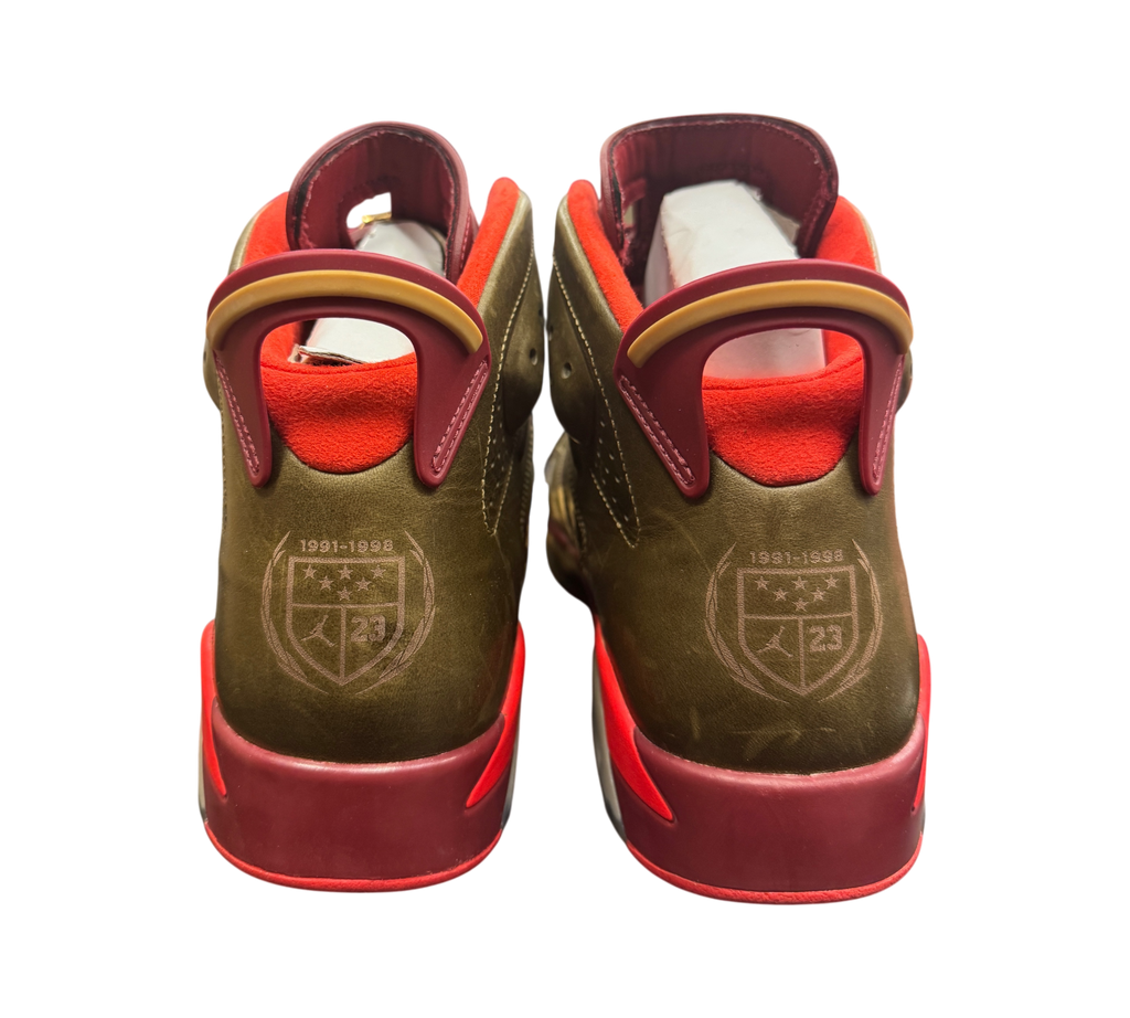 Genesis Boutique Jordan 6 Cigar sneakers in raw umber and team red with championship ring heel detailing