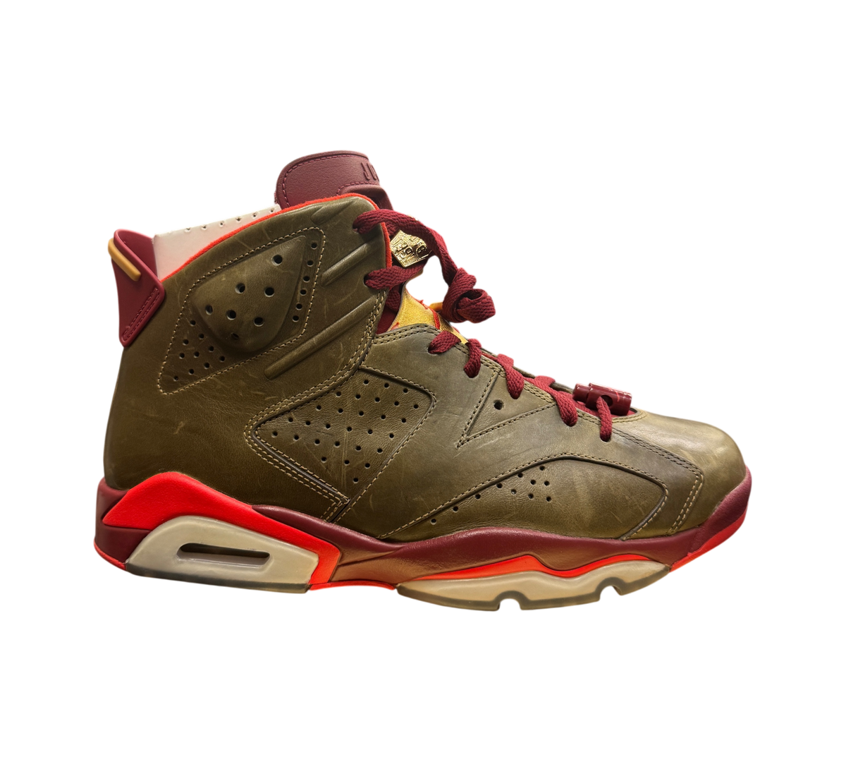Genesis Boutique Jordan 6 Cigar sneakers in raw umber leather with maroon and bright red accents