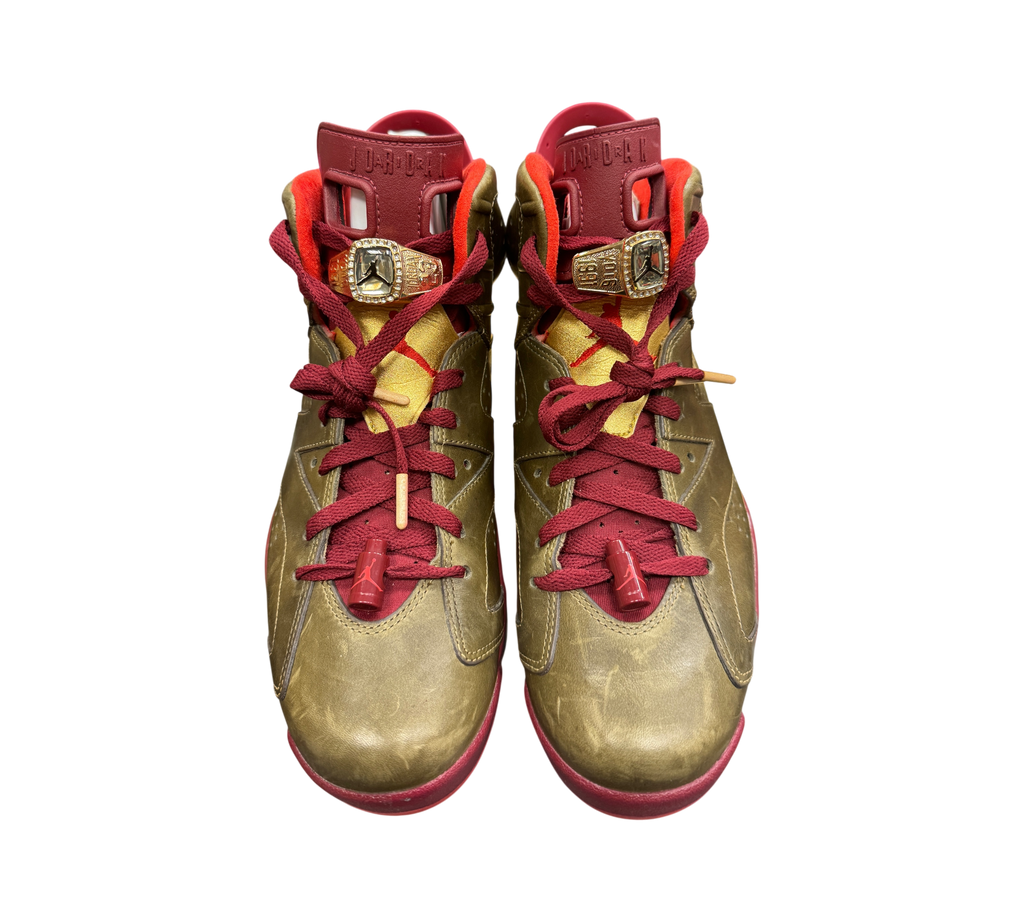 Genesis Boutique Jordan 6 Cigar sneakers in raw umber and team red with gold championship ring lace locks